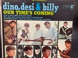 the cover of dinodesi and billy ' s album, our time ' s coming