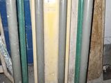 pipes and hoses are stacked on top of each other in a room