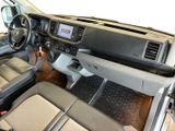 the interior of a vehicle with a steering wheel and dashboard controls