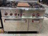 a large stainless steel stove with two ovens on it