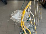 a ladder that is sitting in the middle of a room