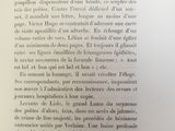 a page of a book with a picture of a cat on it