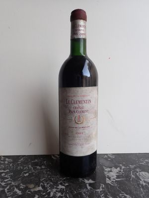 a bottle of wine that is sitting on a table