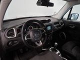 the interior of a small car with a steering wheel and dashboard