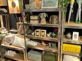 a room filled with lots of different items on shelves