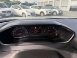 a dashboard of a car in a parking lot