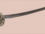 an image of a sword that is on display in a museum