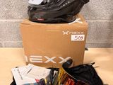 helmet and goggles on a table next to a cardboard box