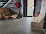 a wooden bench and a wooden bench in a garage