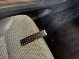 a picture of a car seat with a sticker on it