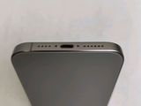 a close up view of the back of a silver cell phone