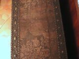 an old book that is sitting on the floor