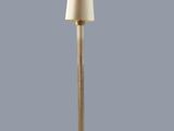 the floor lamp has a white shade on top of it