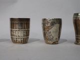 four different types of vases are shown on a white surface