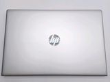a laptop with a hp logo on the screen