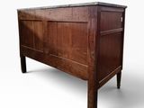 an image of a wooden chest with a marble top