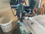 a picture of a machine that is working on a piece of wood