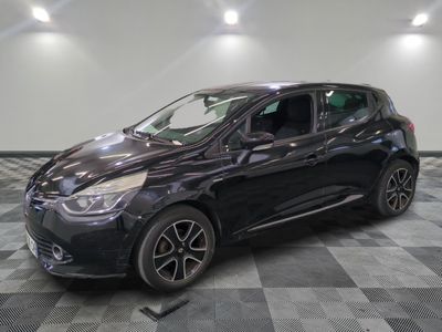 a picture of a black car parked in a garage