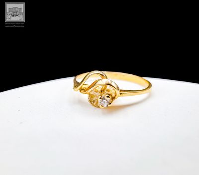 bague plaquée or ornée d'un seul diamant au centre