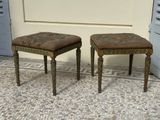 two small stools sitting next to each other on the floor