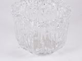 an image of a clear glass bowl on a white surface