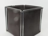 an image of a black metal planter on a white background