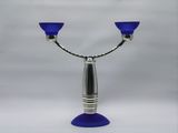 a picture of a blue glass candle holder on a white background