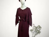 an image of a mannequin wearing a dress and hat
