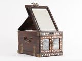 a small wooden box with a mirror inside of it
