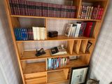 a bookshelf with a lot of books on it