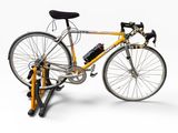 a bike that is sitting on a stand on a white background