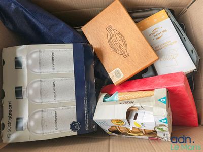 a cardboard box full of items that are in it