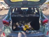 the back of a car with its trunk open and a bike in the trunk