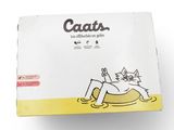 the cat is laying down on the box of catnips