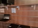 a blurry photo of a kitchen with a stove and cabinets