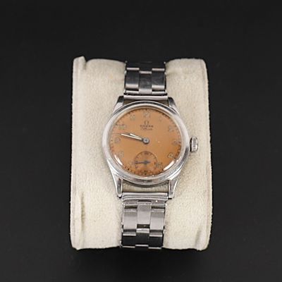 une image représentant une montre-bracelet dotée d'un cadran marron