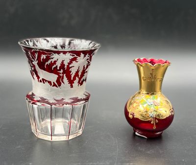 two vases sitting next to each other on a table