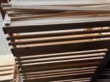 many pieces of wood stacked on top of each other