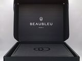 the black box is open with the watch inside of it