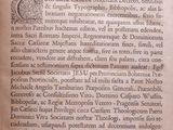an old book that is open on a table