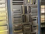 many different types of tools hanging on the wall