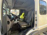 an image of a truck with the door open and the driver ' s seat in the back