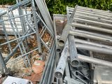 a pile of metal items sitting on top of a pile of rubble