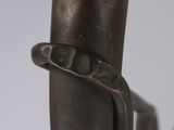 a close up of a metal object with a ring on it