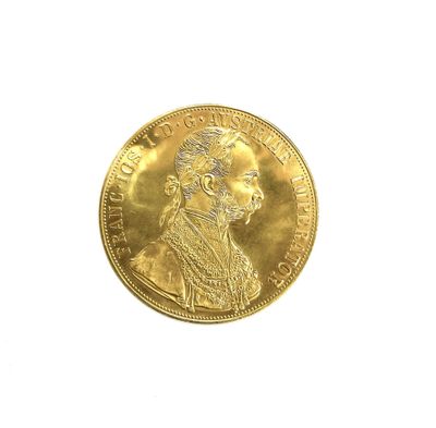 an image of a gold coin with a portrait of a man on it