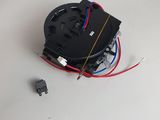 a black clock that is sitting on a white table
