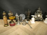 many different types of vases and other items on the table