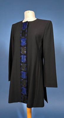 an image of a black coat with blue and black sequins on it