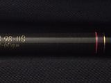 a close up of a baseball bat on a black surface