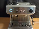 an image of a coffee machine on a wooden table